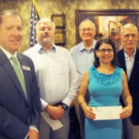 Golden K Kiwanis Club presents checks to four non-profits that assist students